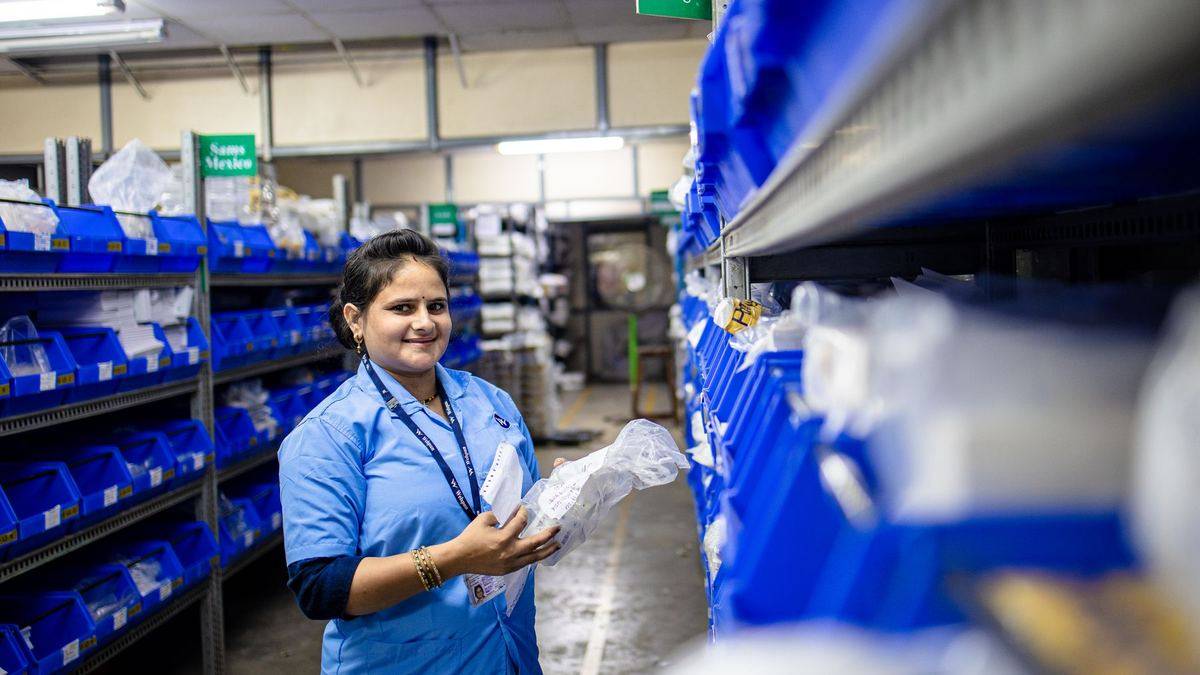 Warehouse associate picking orders for e-commerce deliveries